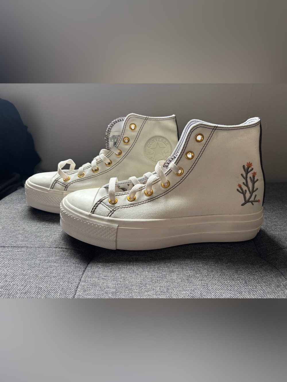 Converse White High-Top Canvas Sneakers with Gold Eyelets